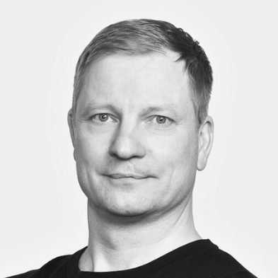 A black-and-white portrait of Salvos employee Lasse Limma wearing a dark sweater