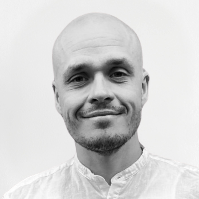 Salvos salesperson Joel Lehtikangas in a black-and-white portrait